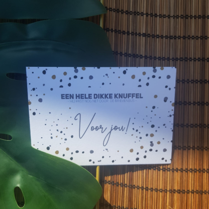 Een hele dikke knuffel met gouden krasrand